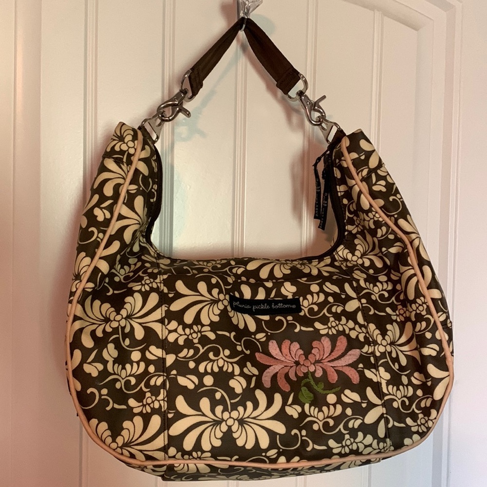 Petunia Pickle Bottom diaper bag in brown and cream print